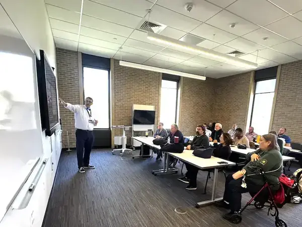 Joe Buckhanan teaches an AI class at the AI Showcase event
